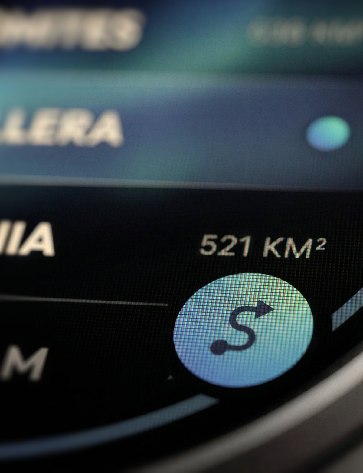 Downloaded regions listed on the display, one showing its area, with the reroute button lit.